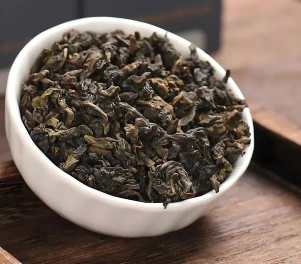 Handcrafted Tieguanyin Oolong Tea with floral aroma, smooth texture, and health benefits like stress relief and digestion support.