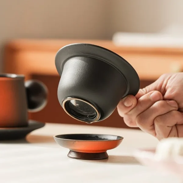 Ceramic Tea Cup Infuser with Stainless Steel Filter, a coffee bean and tea leaf mug ideal for brewing loose leaf tea or coffee.