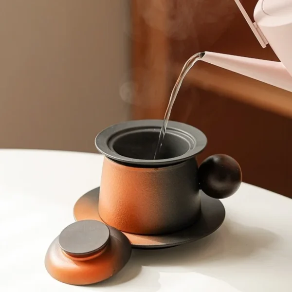 Hot tea mug with lid, a versatile coffee bean and tea leaf mug, ideal for brewing and enjoying awesome tea mugs.