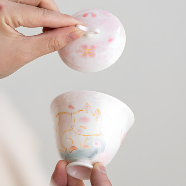 Close-up of a cute tea set, featuring a fox gaiwan tea set, part of elegant porcelain tea service sets for gongfu tea rituals.