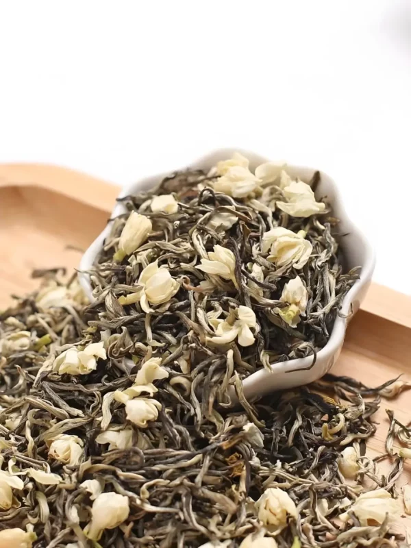 Jasmine Maojian Tea, a premium loose-leaf tea with jasmine flowers, offering jasmine green tea benefits and relaxation.