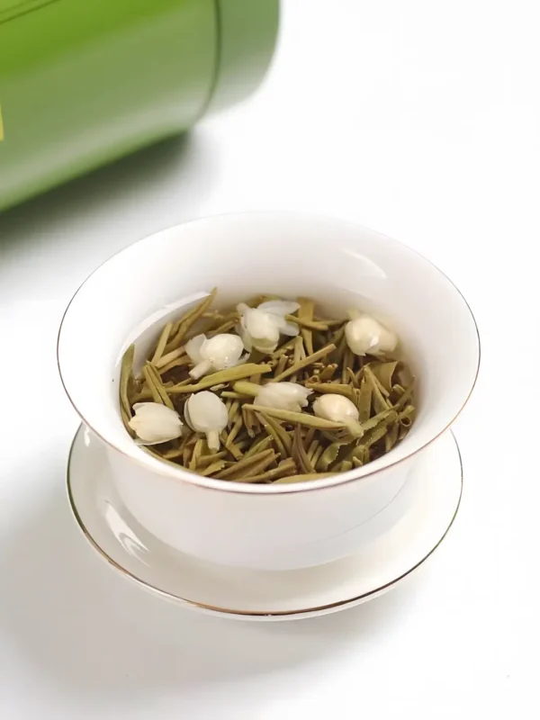 Freshly brewed jasmine Chinese tea with kinds of jasmine flower, offering jasmine tea benefits and evoking a serene jasmine garden.