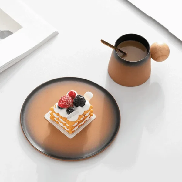 Painted ceramic coffee cup paired with a dessert, styled as a bee coffee cup or espresso coffee cups for elegant coffee breaks.