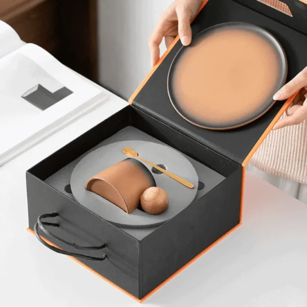 Stylish coffee cup sets with a wide base, featuring coffee cup artwork and a colour changing coffee cup design in premium packaging.