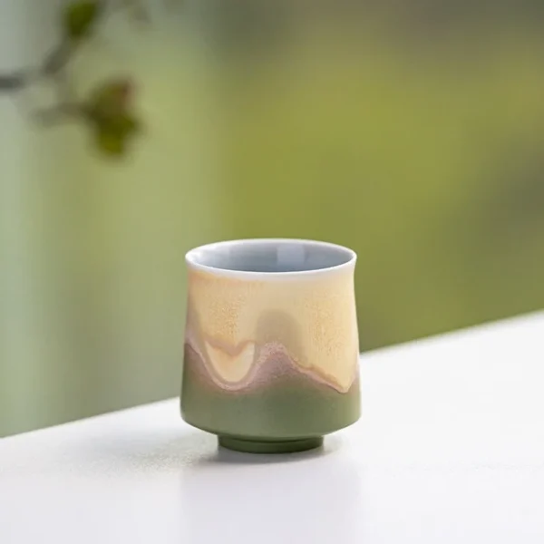 Beautiful weird shaped ceramic wine cup with artistic glaze, suitable as ceramic coffee cups or handmade ceramic tea cups.