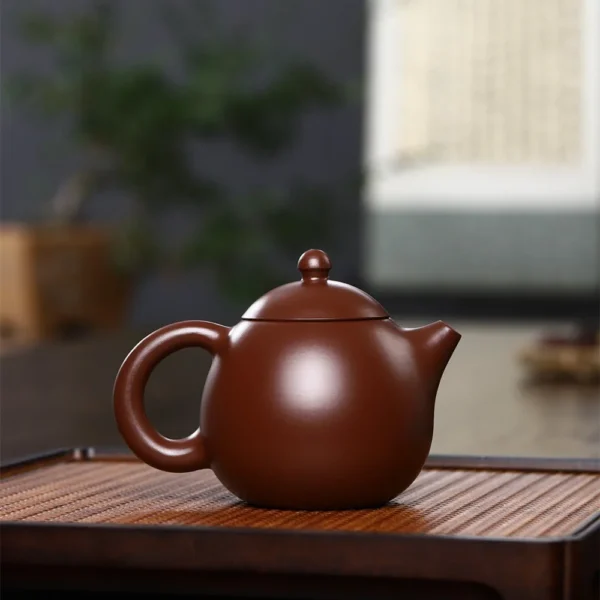 China teapot with aesthetic Dragon Egg design, perfect tea brewing pot for elegant tea sessions and appreciating ceramic craftsmanship