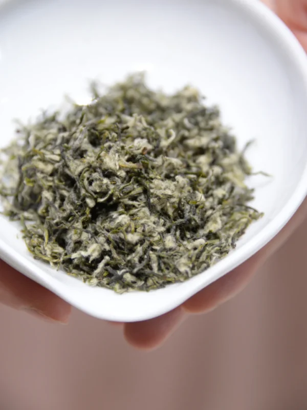 Handpicked early spring Biluochun tea from Dongting Mountain, rich in antioxidants, floral aroma, and a refreshing sweet finish.